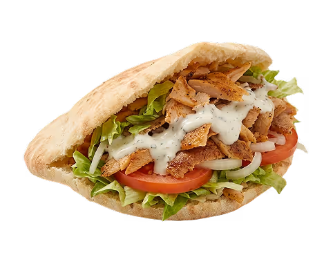 Döner kebab sandwich met gesneden vlees, sla, tomaat, ui en knoflooksaus in vers pitabrood.